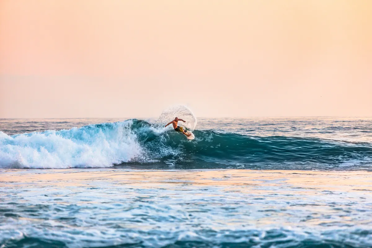 Surfer riding a wave